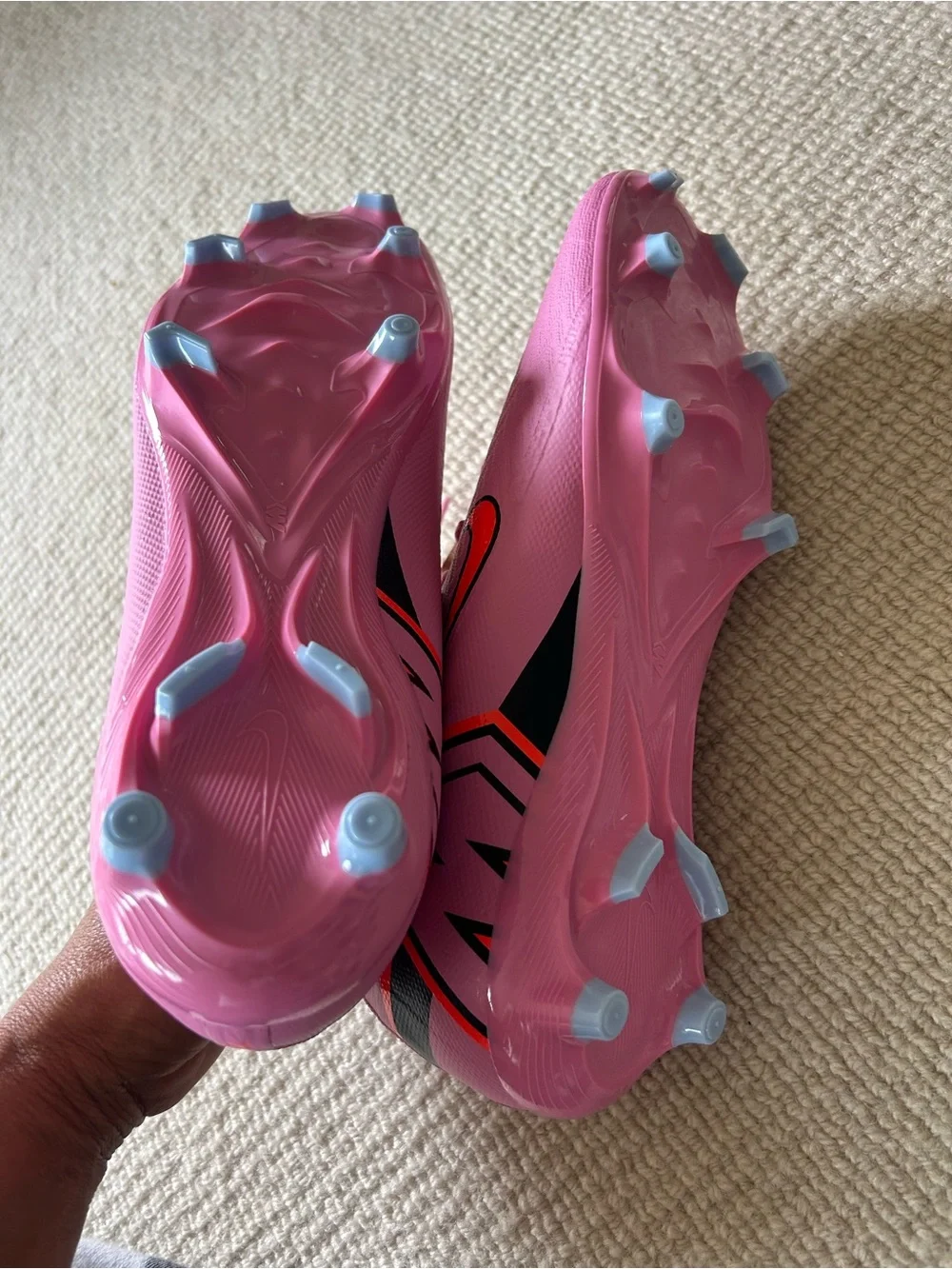 Nike Women’s Pink Sneakers with Orange Swoosh